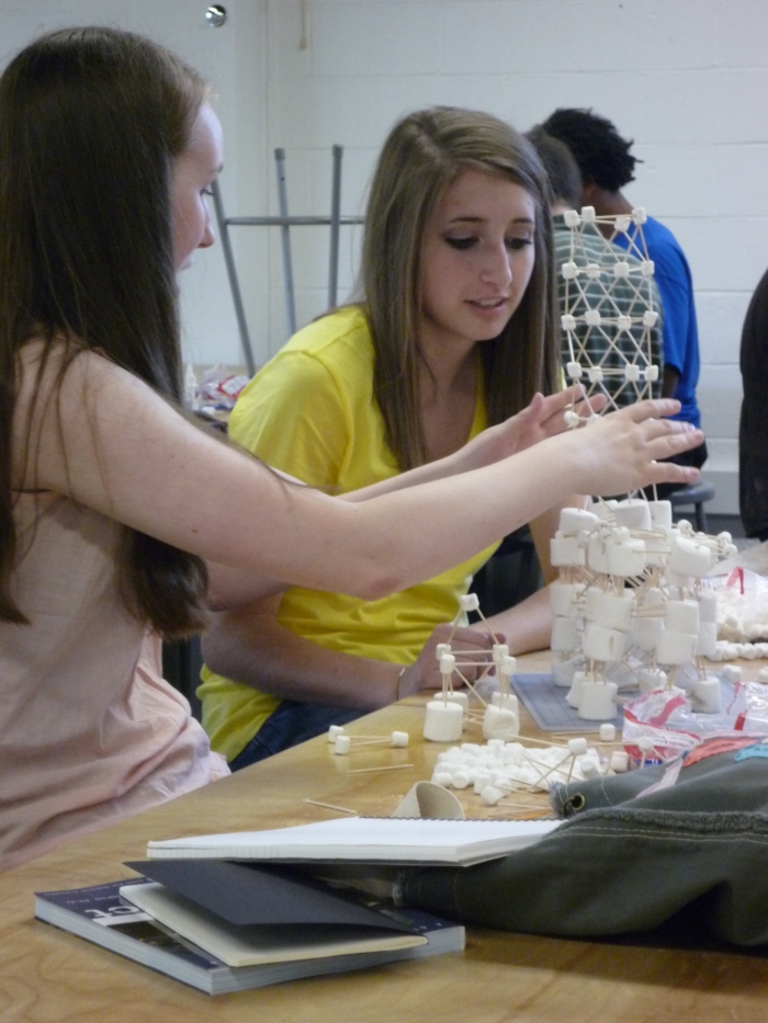 Tallest Tower Competition! | Lucille and Brittany working on tower.